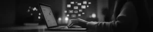 Woman working on laptop with digital icons